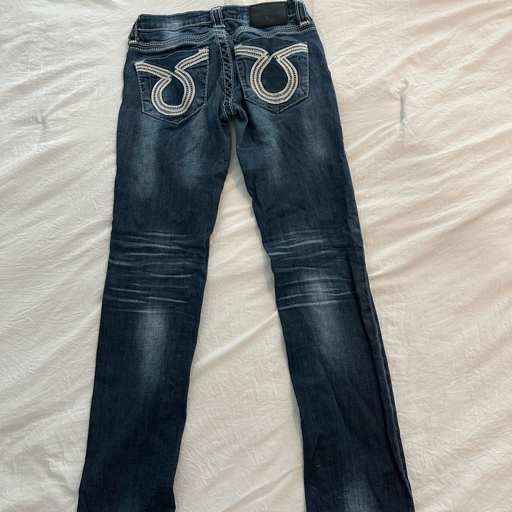 Ladie’s Blue Jeans with Embroidered Pockets